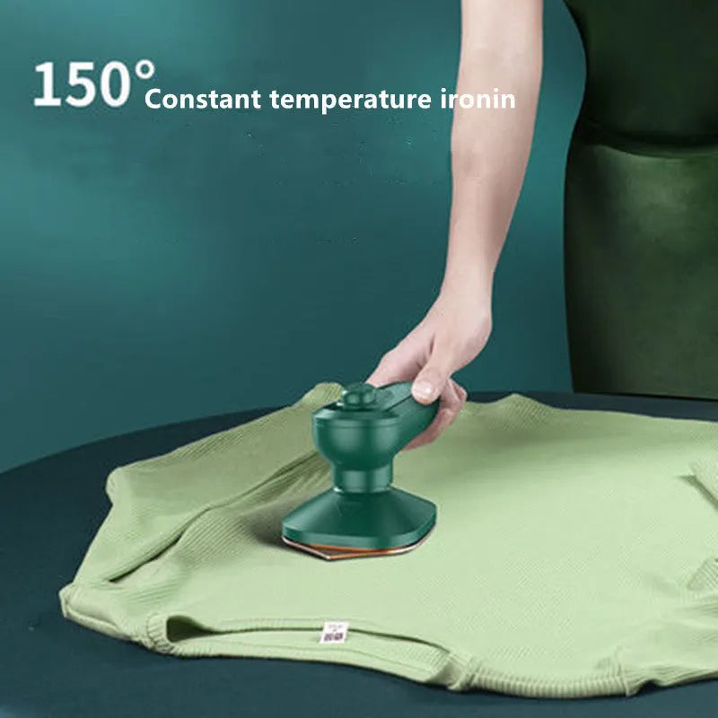 Dark green portable hanging steam iron with ceramic panel and handheld design