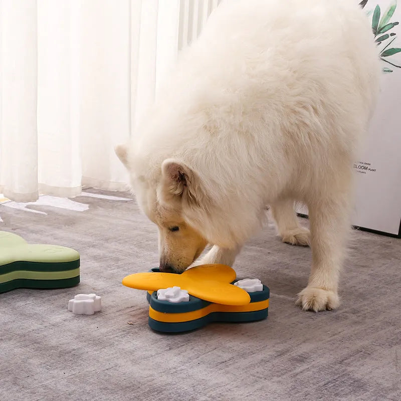 Green and yellow dog puzzle toy slow feeder with nine hidden treat compartments and bone covers