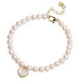 Freshwater pearl bracelet with fan-shaped pearl arrangement showing elastic string and extension chain fastening options