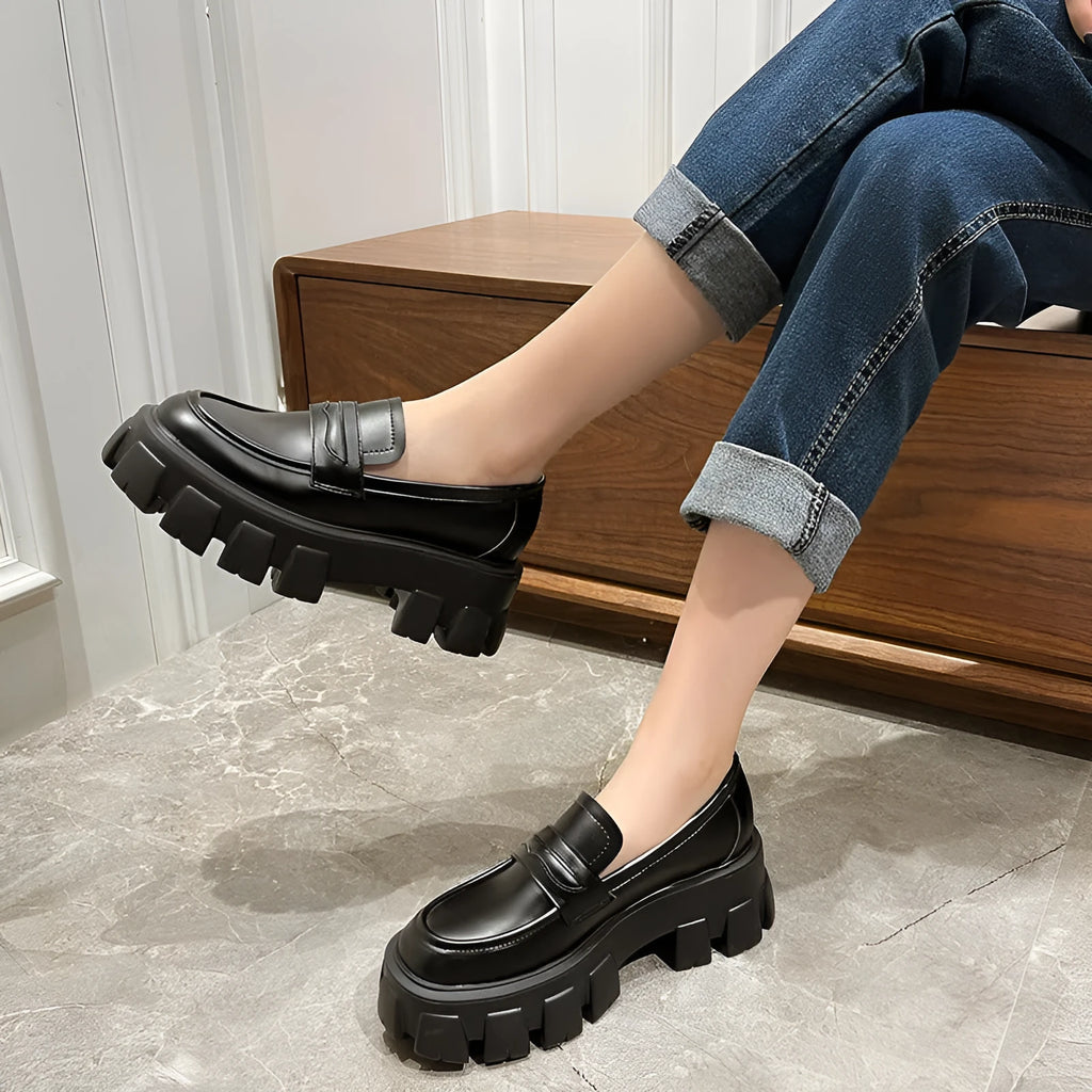 British style wide fit loafers in either matte or patent leather with distinctive muffin heel