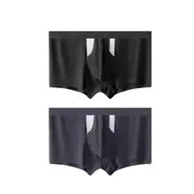 Men's black ice silk double-layer underwear shorts on a grey background.