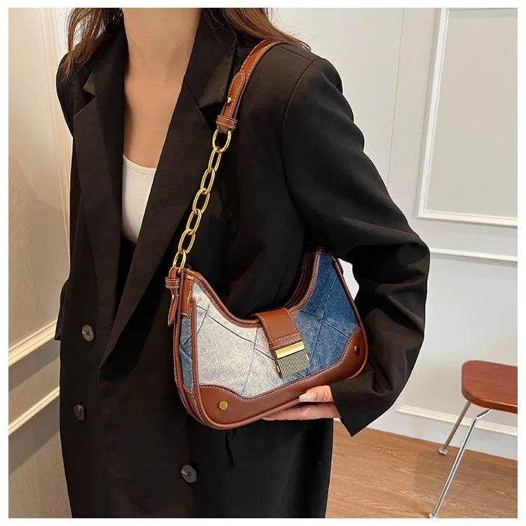 Brown denim women's bucket shoulder bag with chain straps and diamond mesh detailing