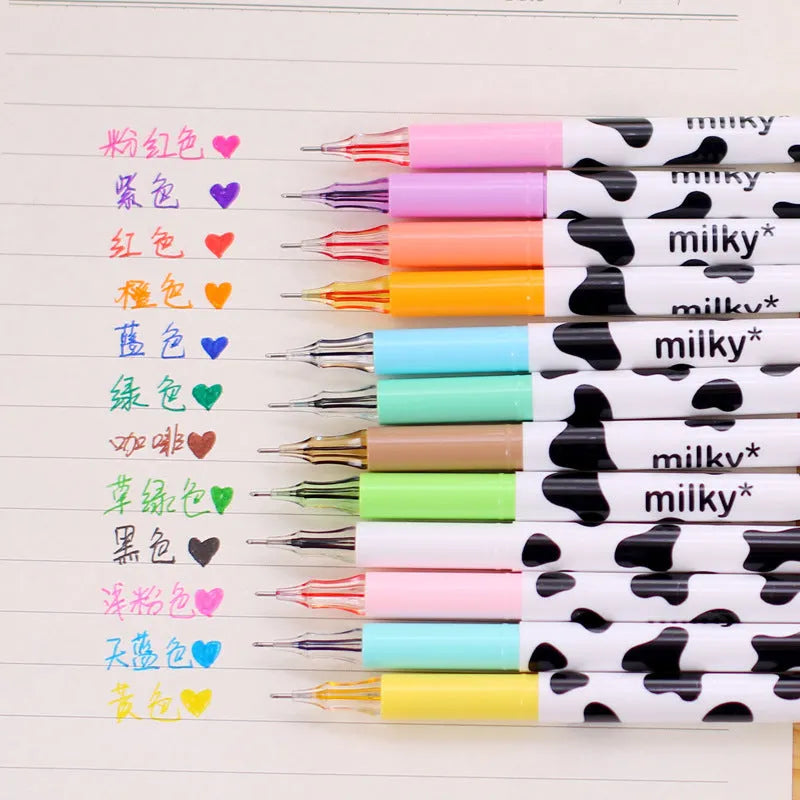 Cow pattern gel pen set showing 12 coloured pens with 0.38mm fine tips