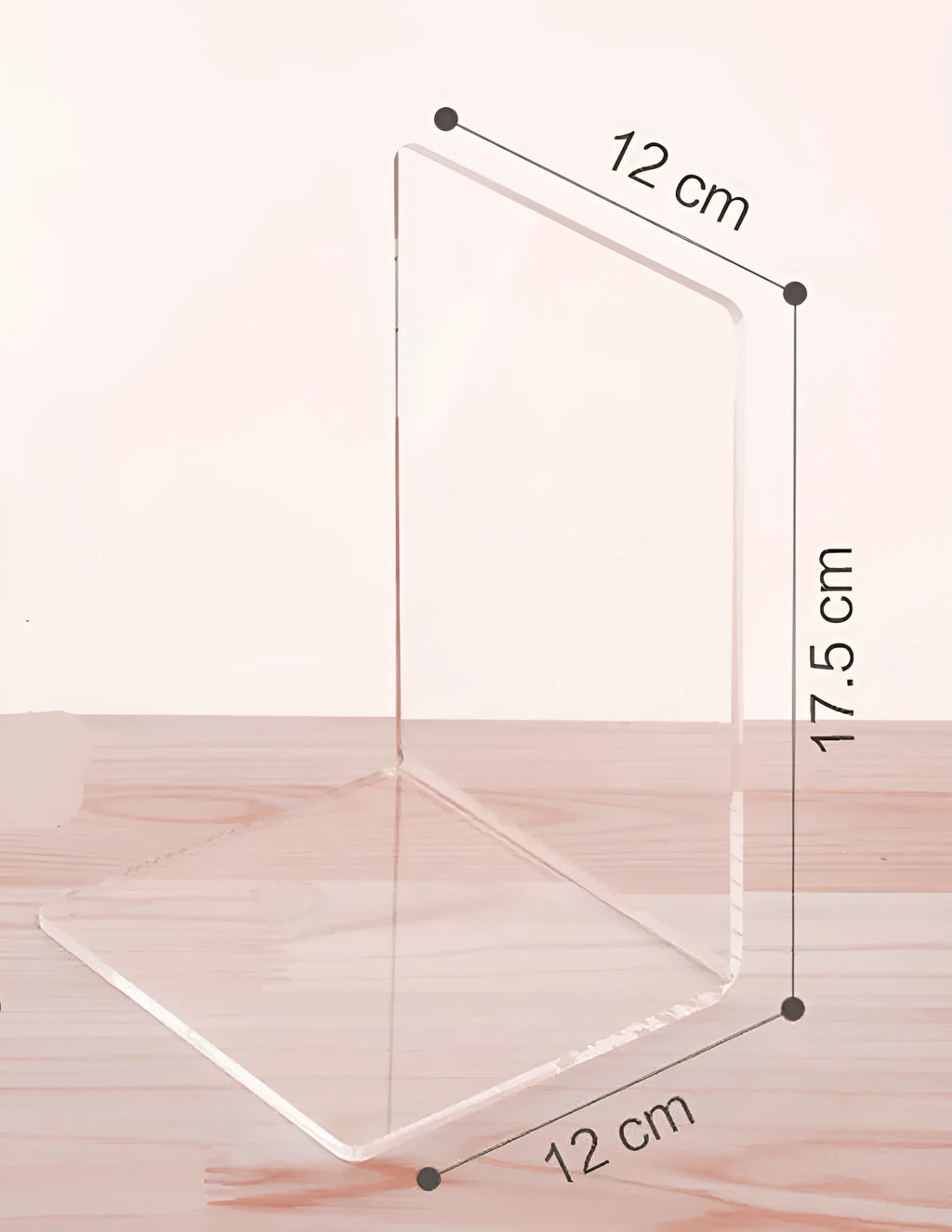 Transparent acrylic bookcase displaying textbooks on smooth-edged plexiglass shelf