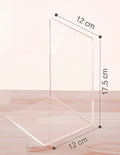 Transparent acrylic bookcase displaying textbooks on smooth-edged plexiglass shelf