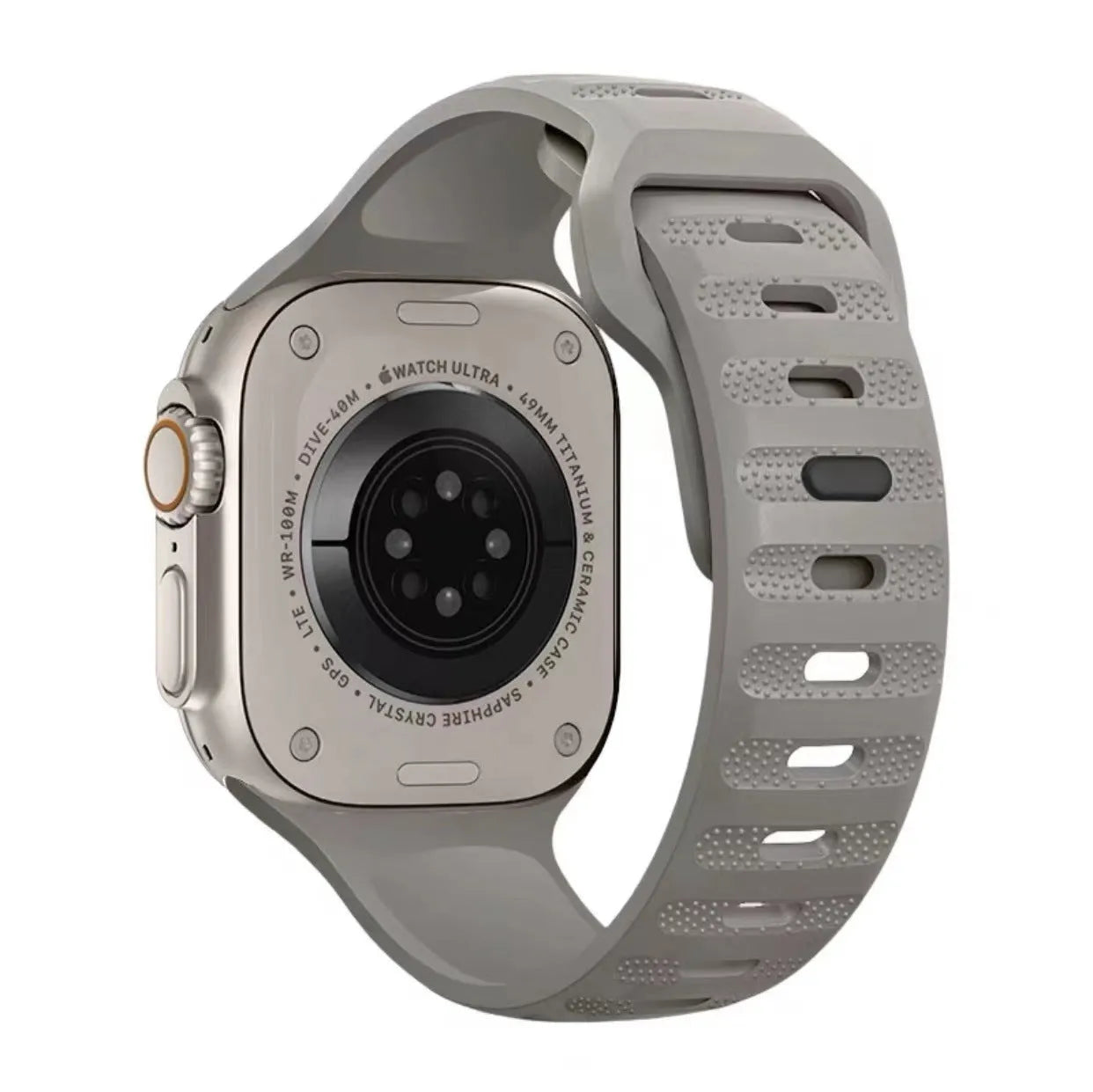 Fluoro rubber Apple Watch replacement strap with T buckle in one of six colours on a wrist.