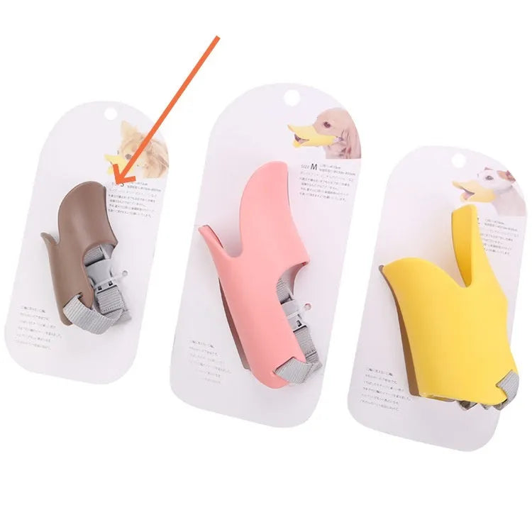 Silicone dog mask duckbilled sleeve anti-bite in bright yellow, pink, and brown sizes S M L