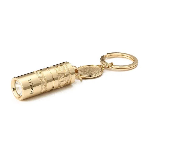 Gold waterproof LED flashlight keychain with zinc alloy die-cast housing and polished finish