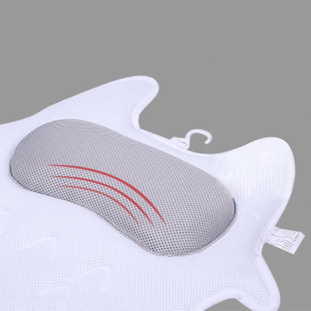 White ergonomic bathtub pillow with owl shape, 5D mesh fabric, and strong suction cups on a smooth bath surface