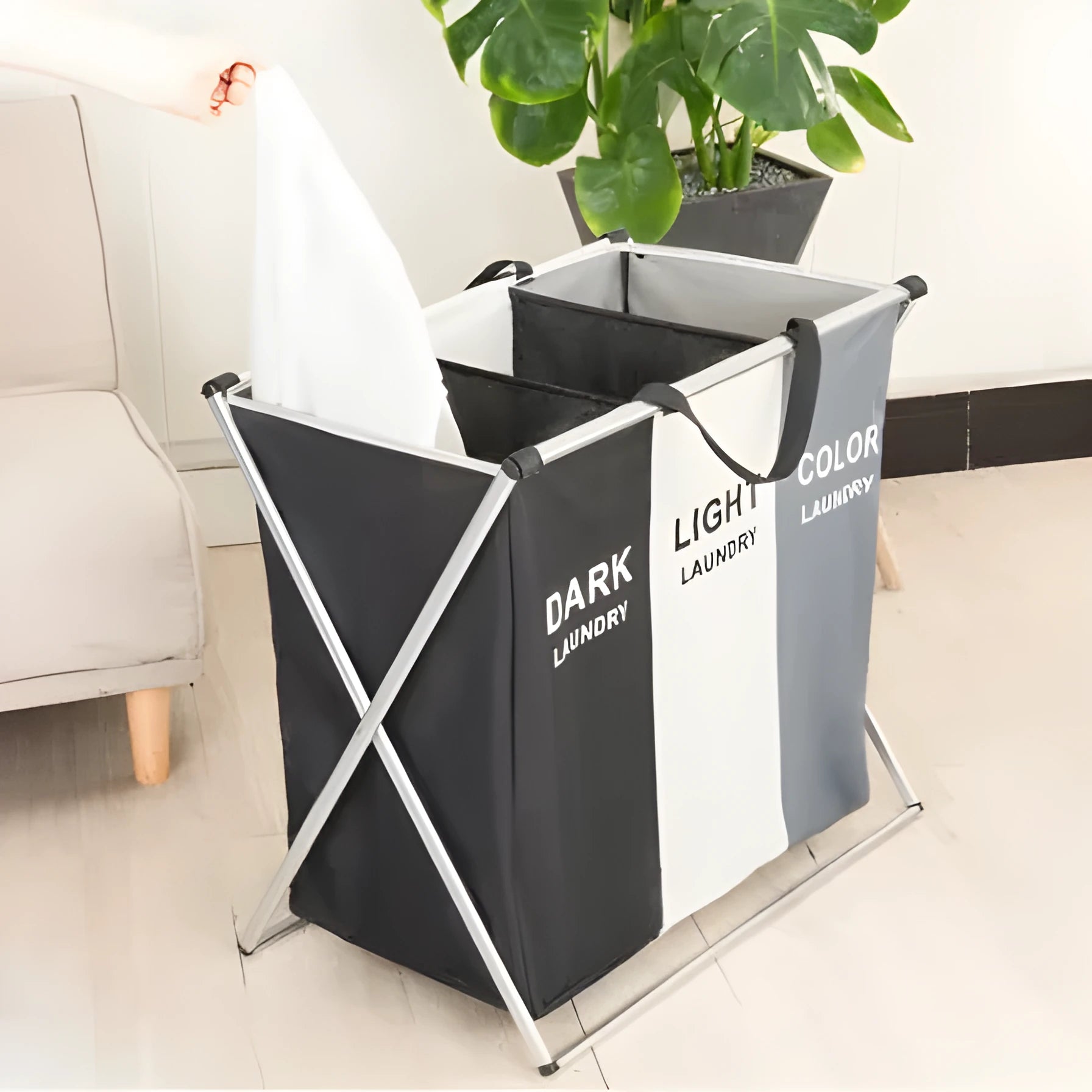 Grey foldable 3-compartment laundry basket with Oxford cloth body and aluminium frame