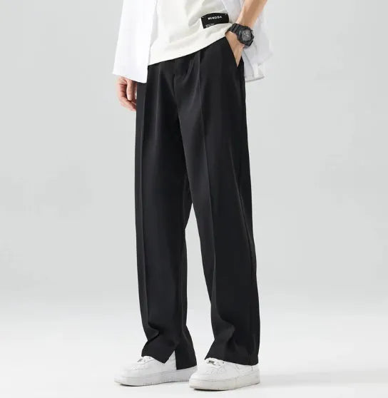 Men's loose straight ice silk casual pants in black, washed finish, side view