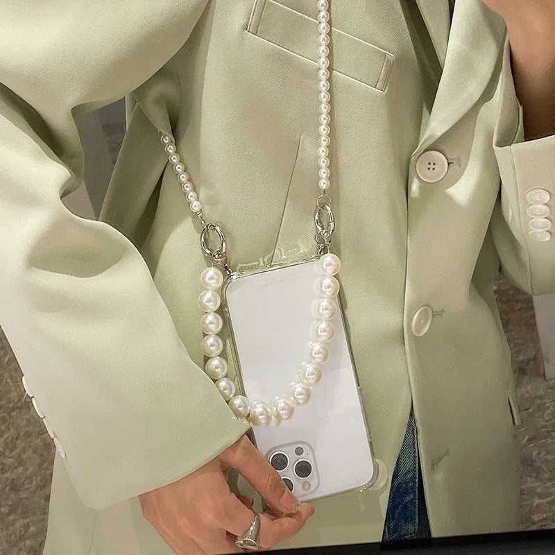 Soft mobile phone case with a white pearl charm chain attached, shown in a selected colour.