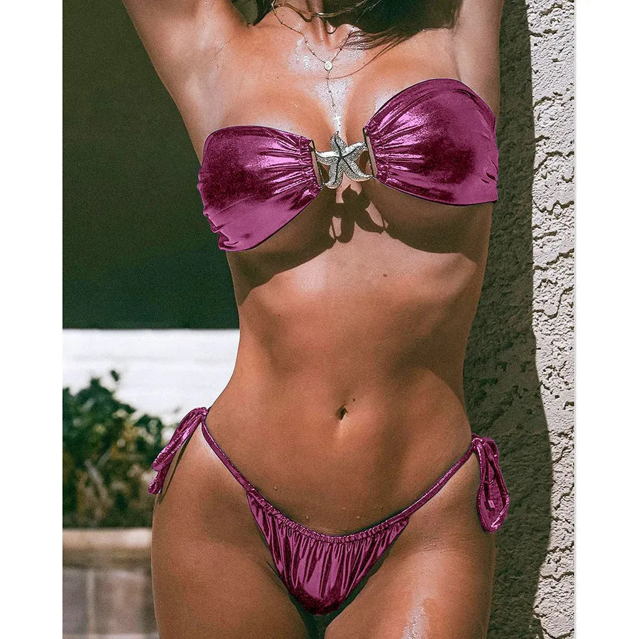 Women's glossy sapphire blue tube top bikini with starfish detail and long sleeves.
