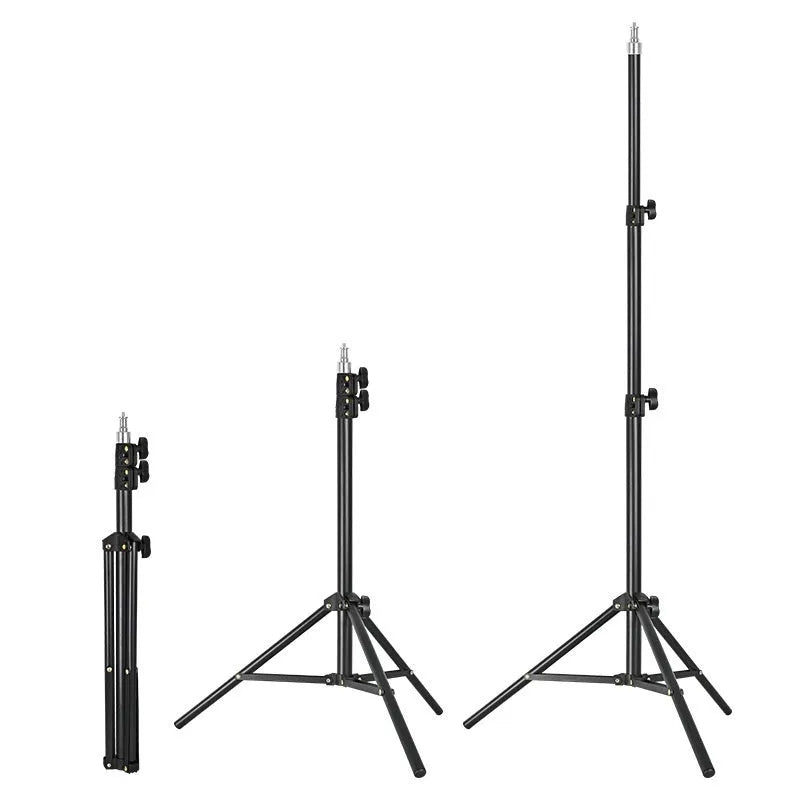 Frosted tripod light stand with mobile phone holder mounted, showing carbon steel construction