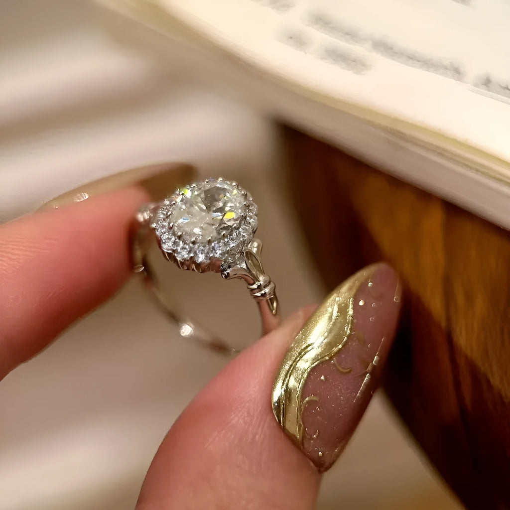 Adjustable silver geometric ellipse bridal bouquet ring with diamond surface treatment