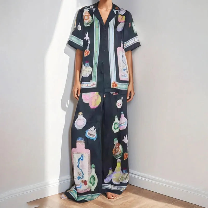 Black women's cardigan and trouser set with cartoon animation pattern