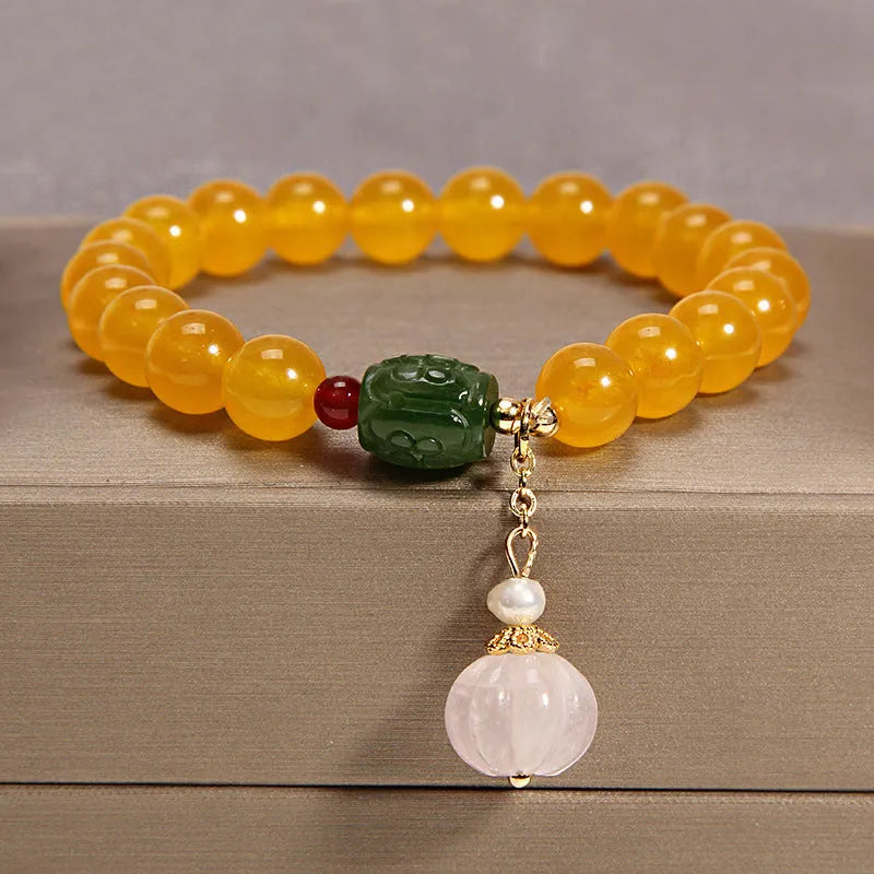 Women's yellow agate crystal bracelet with gold tone accents and khaki silk thread in Japanese Korean style