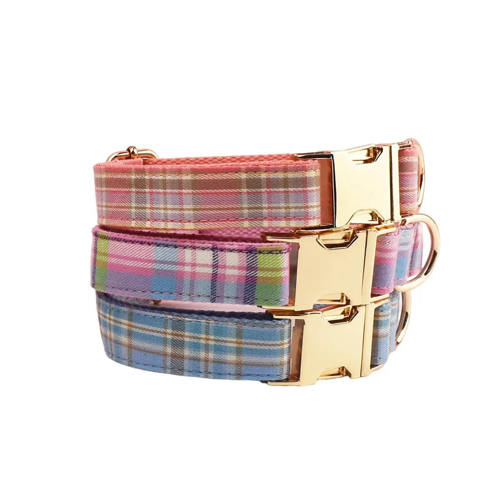 Four-piece dog accessory set with collar, leash, vest and decorative bow in cloth construction