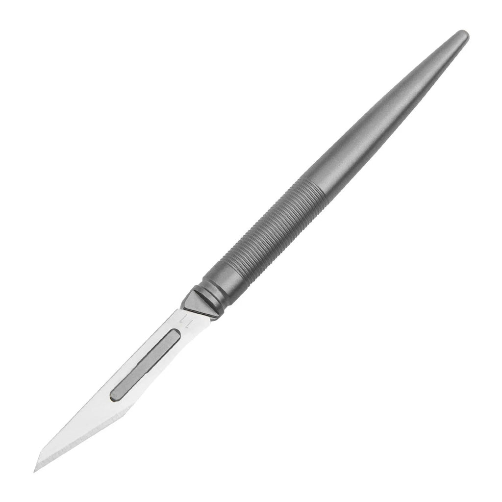 FK35 titanium alloy paper cutter with 22mm blade and 45 degree tip on a cutting mat