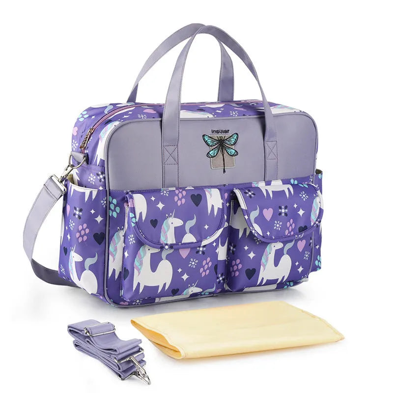 Crossbody portable mother and baby bag in 380T nylon with multifunctional strap, Flamingo colour option shown