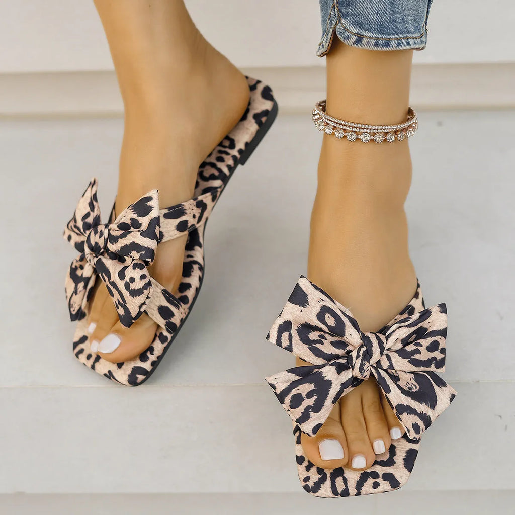 Women's leopard print square toe sandals with bow detail on cloth cover upper, rubber sole, in European American style.