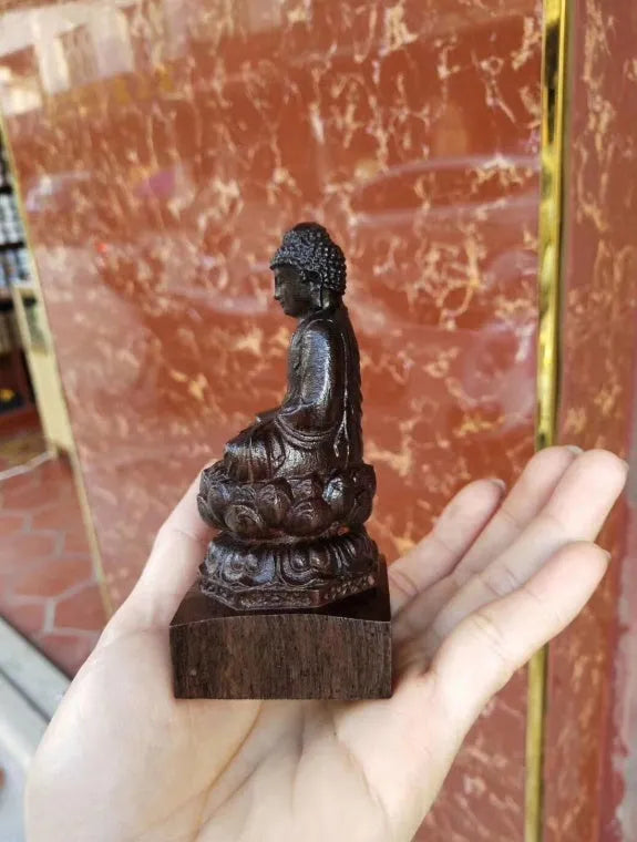 Natural black wood carving of Sakyamuni Buddha, 30cm tall, seated ornament for home or office