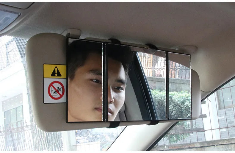 Silver car folding makeup mirror shown closed at 15.5cm and open at 30.5cm wide.