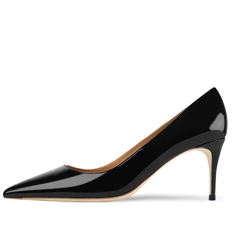 Women's black pointed toe high heel shoe with a fine heel and soft rubber sole