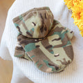 Camouflage polyester dog sweater on display, available in sizes XS to XL for dogs up to 9kg