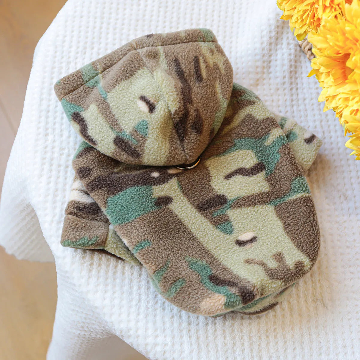 Camouflage polyester dog sweater on display, available in sizes XS to XL for dogs up to 9kg