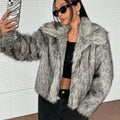 Artificial fur coat with fox fur style design in black tip colour variation