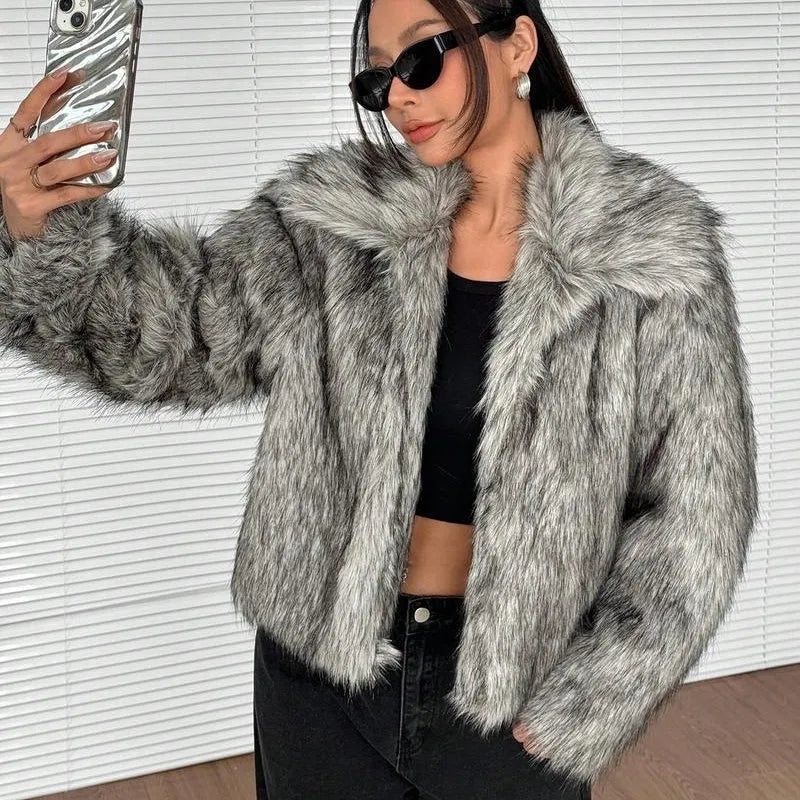Artificial fur coat with fox fur style design in black tip colour variation
