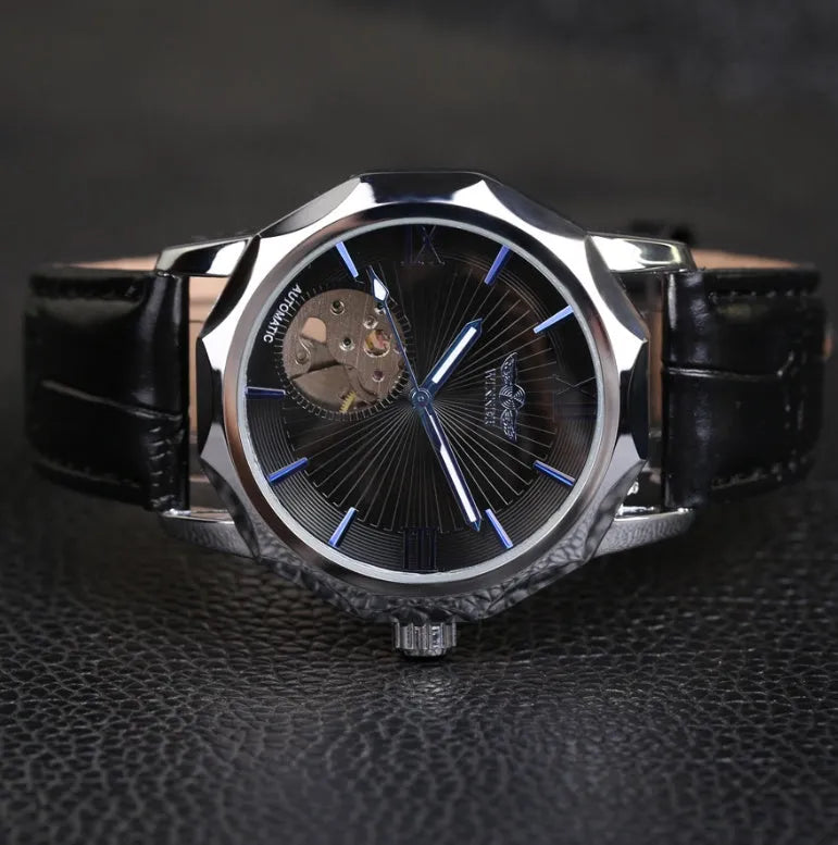 Aqua watch with black strap and white dial showing 4.2cm surface and slim profile