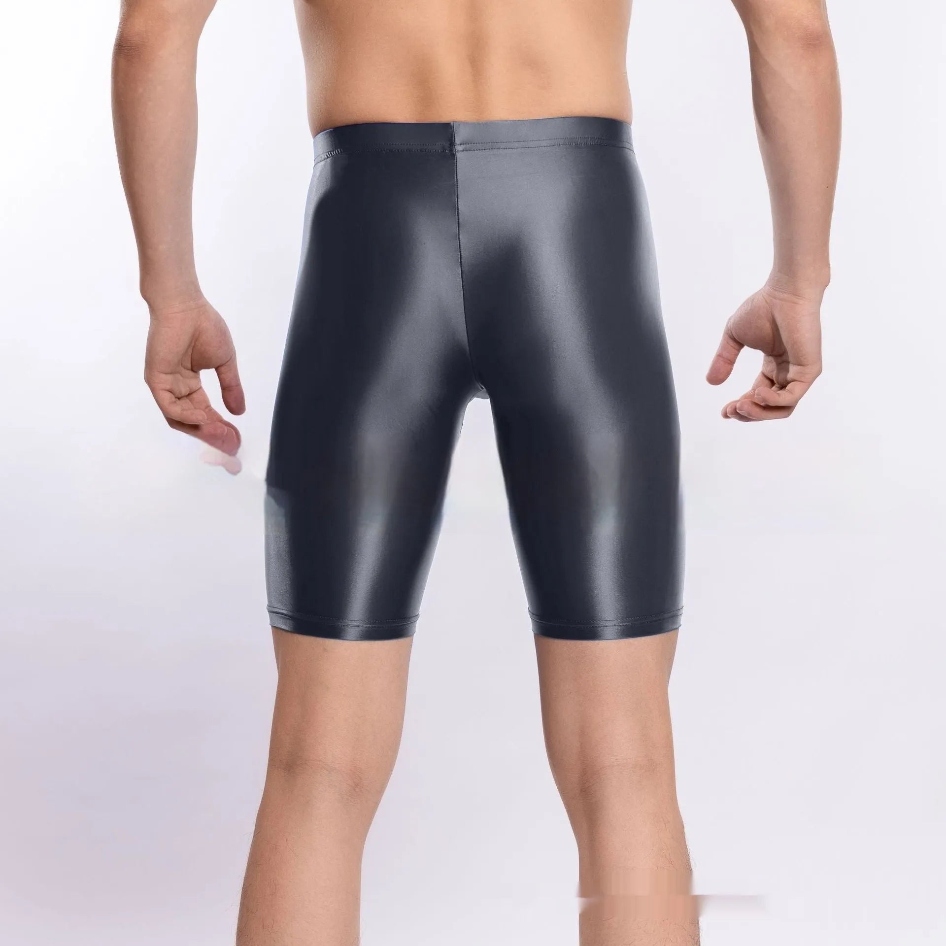 Men's shiny black nylon sports shorts laid flat, plus size range up to XXL.
