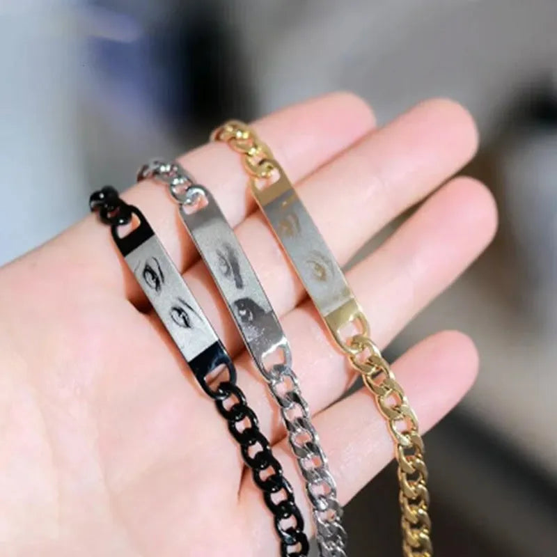 Personalised laser engraved human eye portrait on a stainless steel bracelet in a gold finish, geometric design