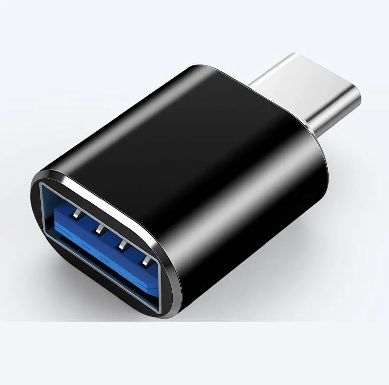 Type-C USB OTG adapter for smartphones and tablets in black, silver, and gold colour options