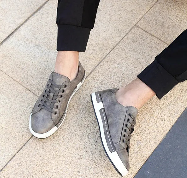 Handmade men casual shoes with rubber sole and front tie lace up in brown colour on display