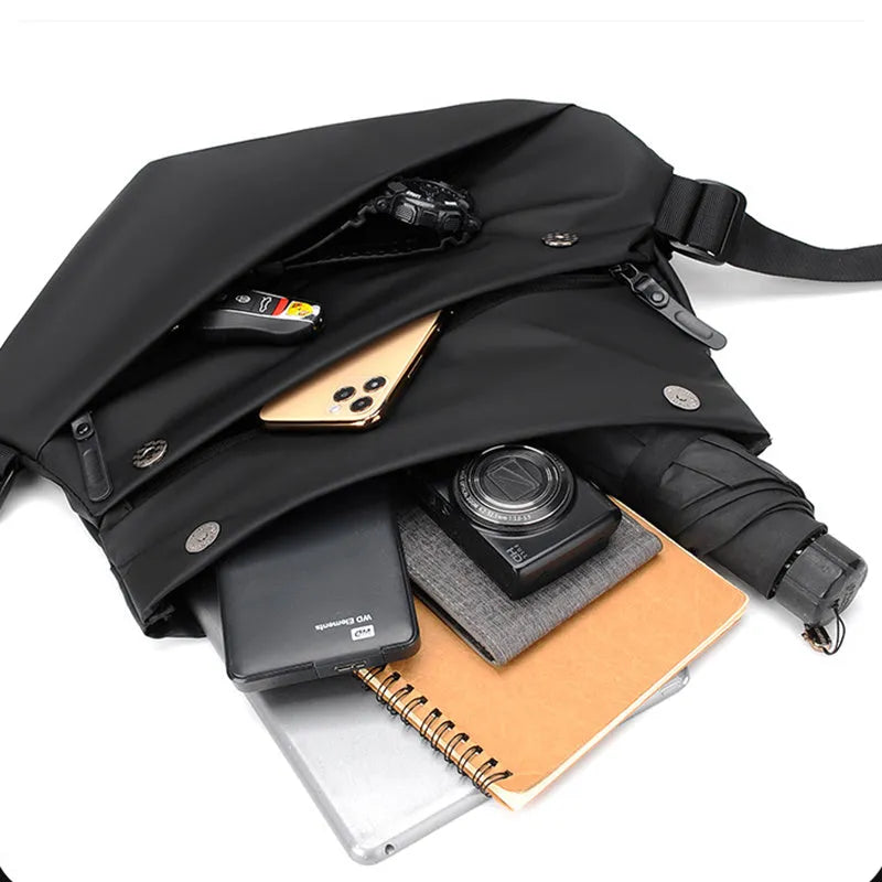 Men's medium crossbody shoulder bag in black or grey PU leather with internal organisation compartments