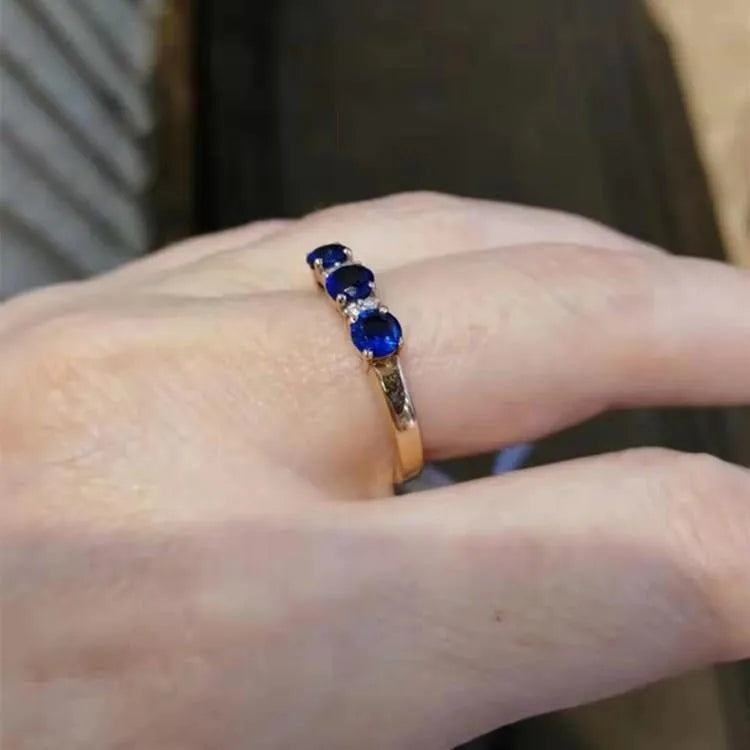 Blue stone ring with adjustable opening, purple and rose gold electroplated copper, geometric live head style