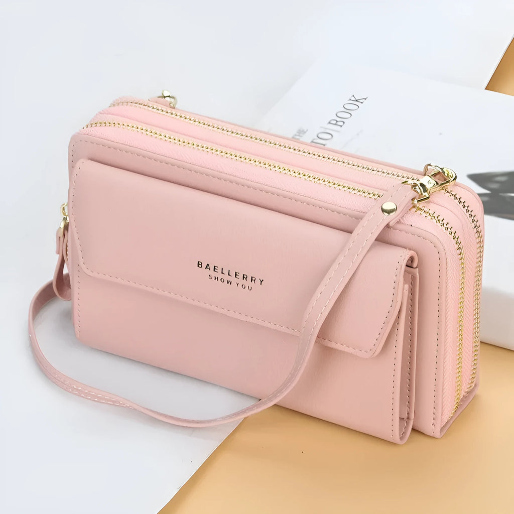 Red ladies long wallet crossbody bag with double zip, shown on a model