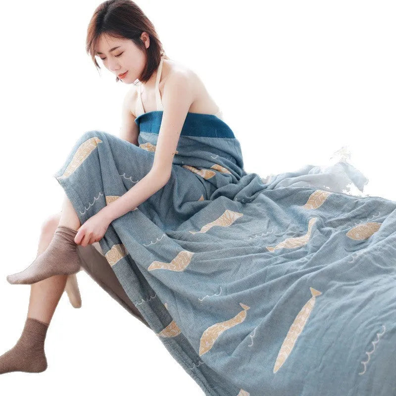 Pure cotton five-layer gauze towel blanket in Roulette Wheel Blue, shown on a bed.