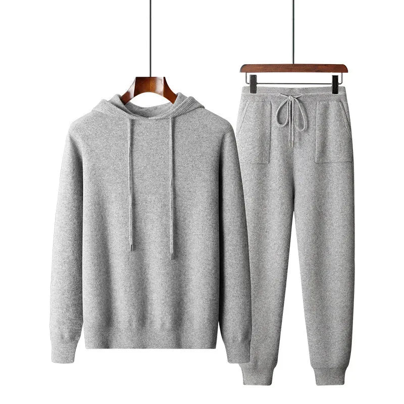 Men's light grey cashmere hooded sweatshirt and trousers set for winter leisure wear.