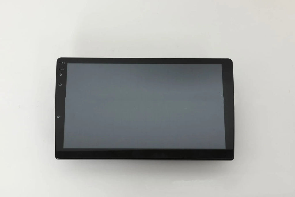10.1 inch universal Android car stereo head unit with trapezoid touch screen display for dashboard installation.