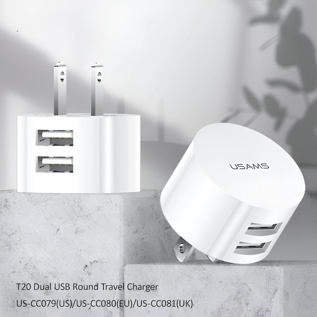 White portable USB phone charger with built-in US EU UK adapter plugs showing compact dimensions