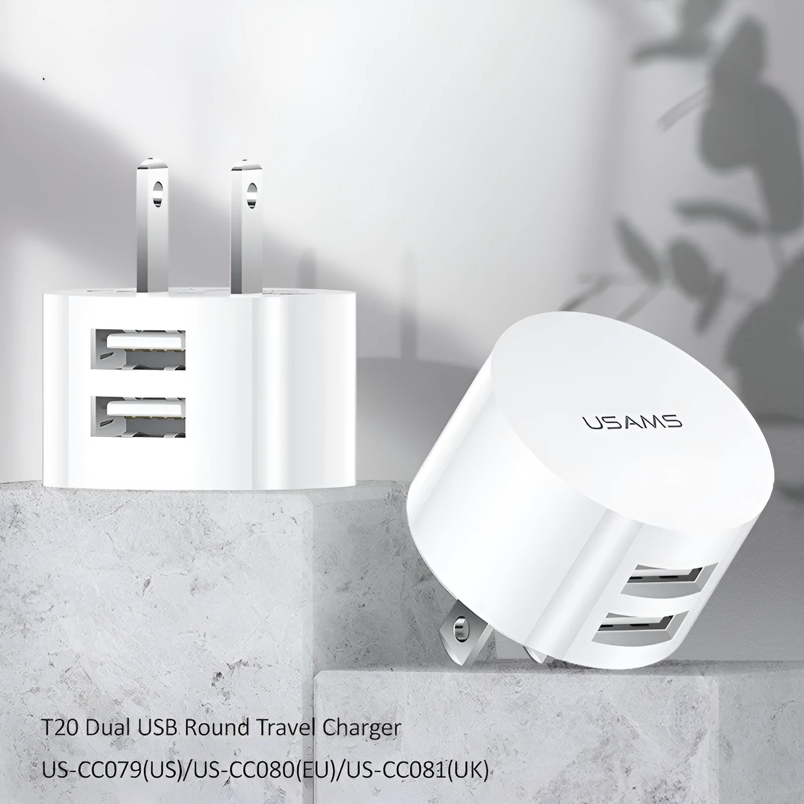 White portable USB phone charger with built-in US EU UK adapter plugs showing compact dimensions