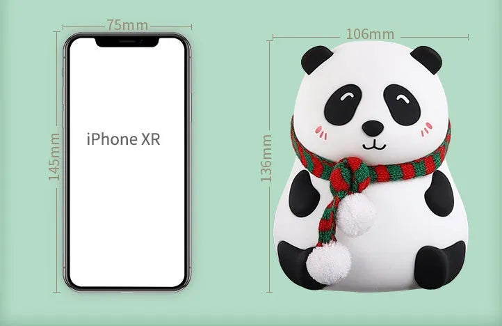 Panda-shaped silicone night light with USB cable on a table