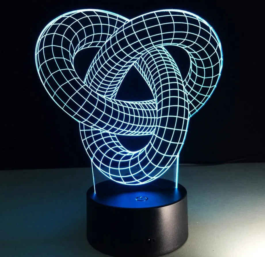 Knot 2 3D optical illusion LED lamp hologram with remote control and touch operation on a table