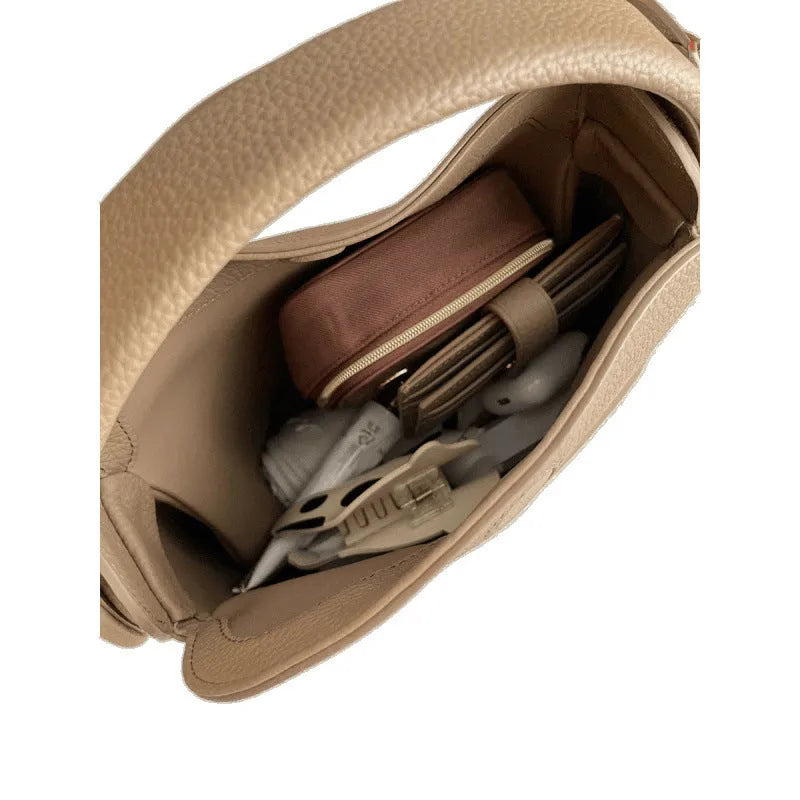Grey women's corduroy shoulder messenger bag with adjustable strap, 24x10x17 cm, on a plain background.