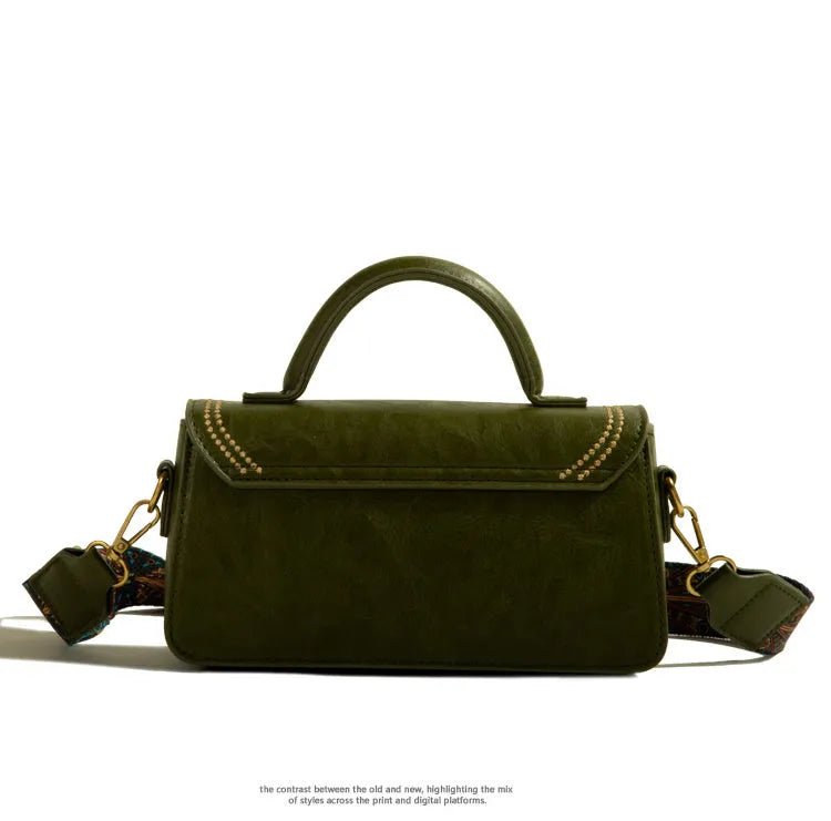 Brown retro-style women's messenger bag with square shape, shoulder strap, and visible front pocket.