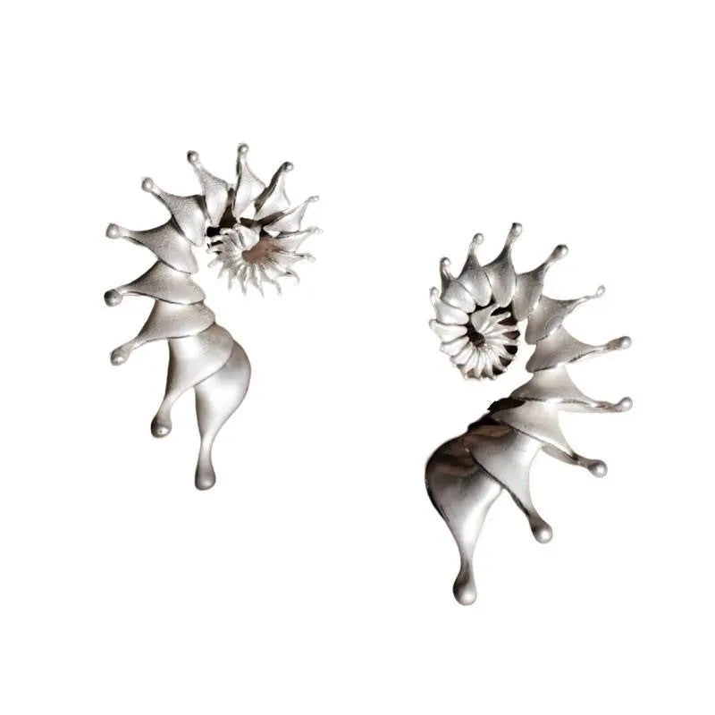 Three-dimensional matte finish conch shell stud earrings with irregular geometric design